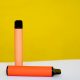 two disposable e-cigarettes on a yellow background. The concept of modern smoking, vaping and nicotine. Top view