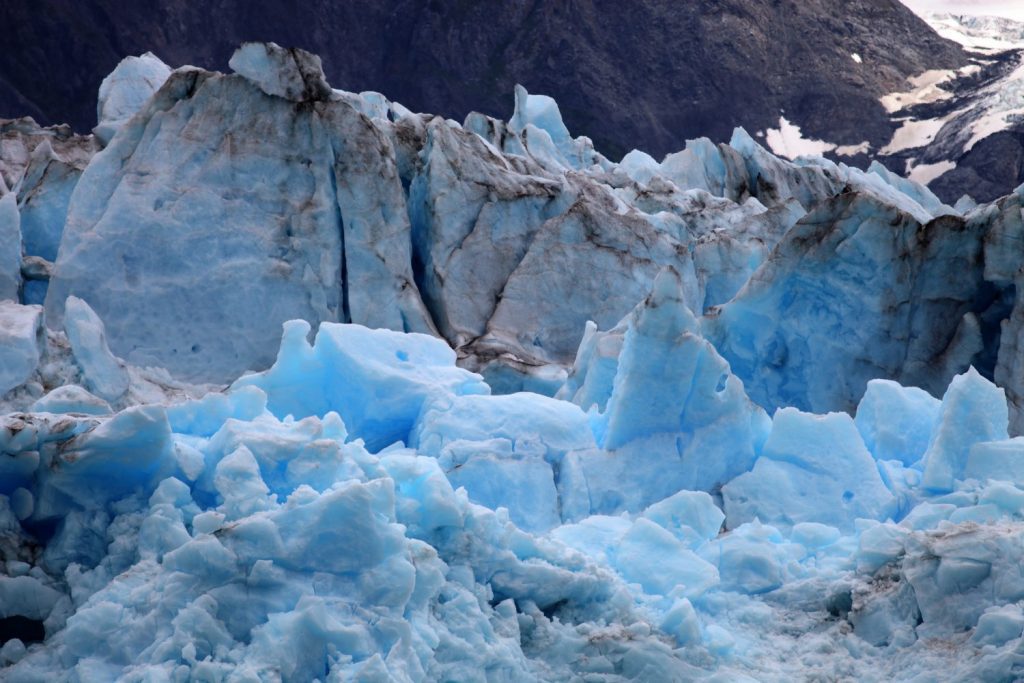 An arctic glacier coast in the mountains in Alaska