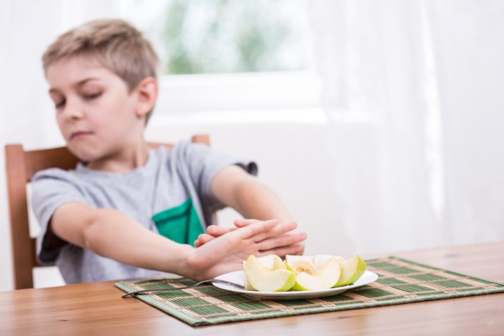 Little kid refusing to eat healthy food